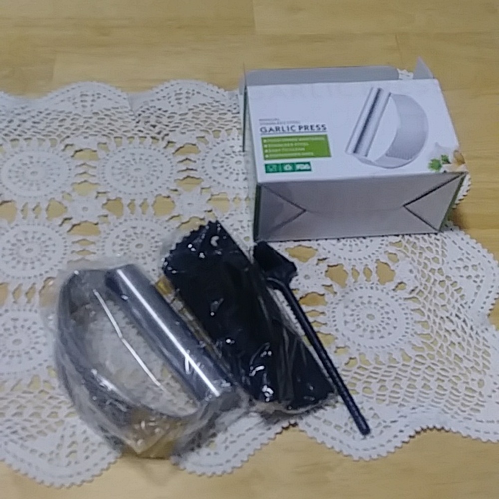 Stainless Steel Garlic Press, new in opened box